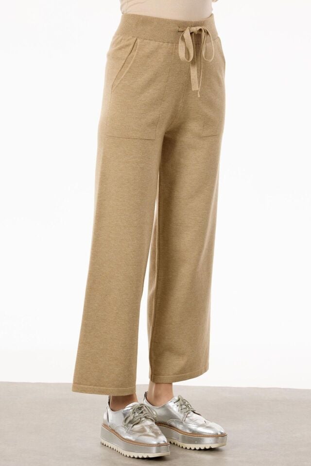 TKM.21754.1	ÖNÜ GEOMETRİK PAYETLİ PANTOLONLU TRİKO TAKIM #11-25#