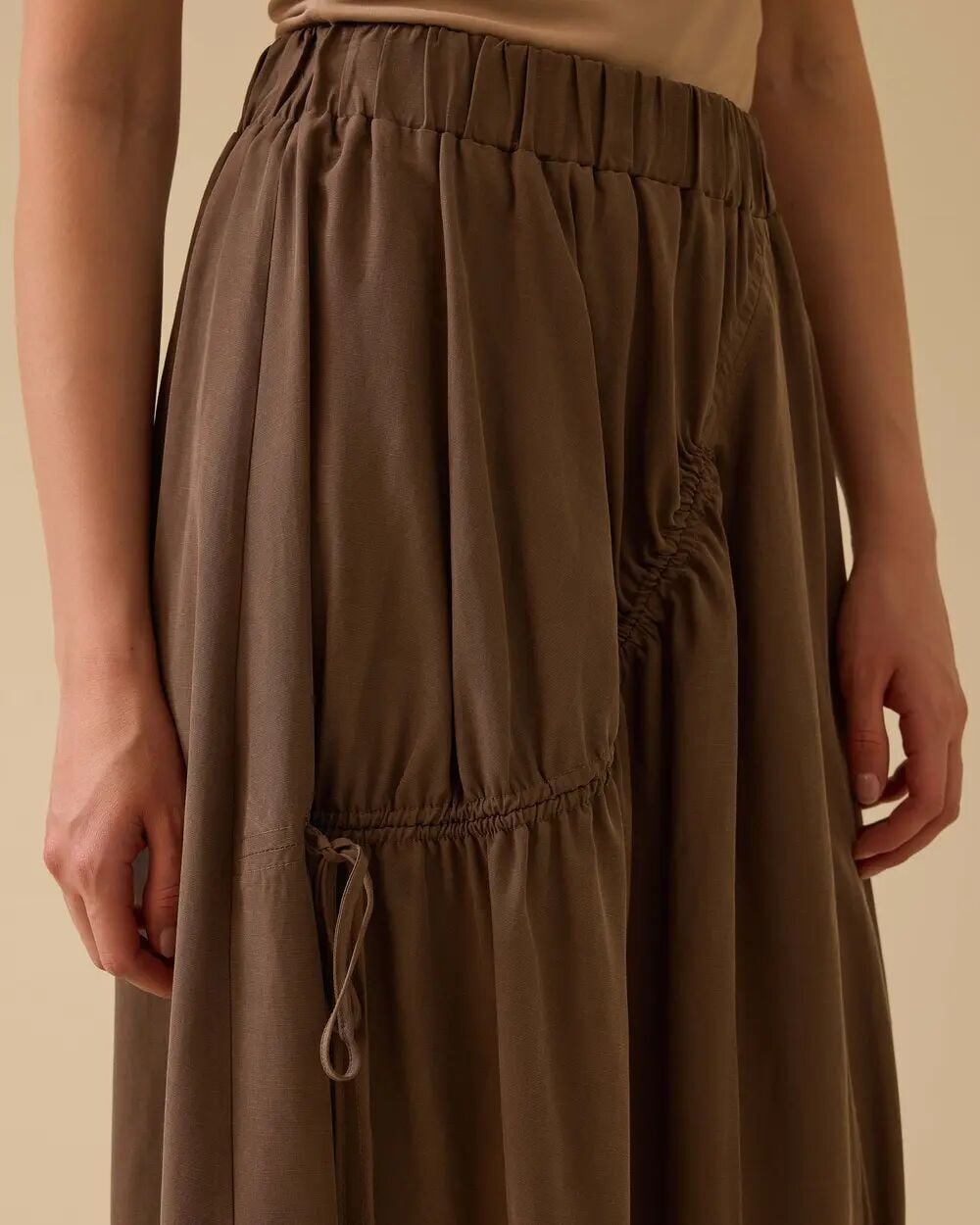 1018 BÜZGÜLÜ BELİ LASTİKLİ SPOR ETEK 10002511611018 #06-25#