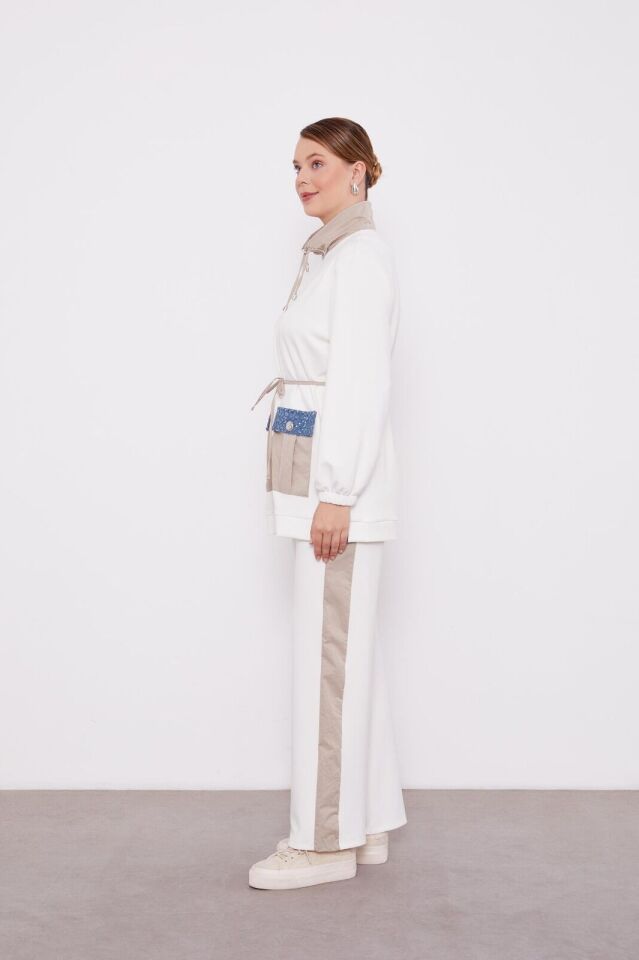 100527 TAKIM KOL UCU LASTİKLİ ÖNDEN FERMUARLI CEP DETAYLI BELİ BAĞLAMALI PANTOLONUN BELİ LASTİKLİ VE YAN DETAYLI TAKIM QKS