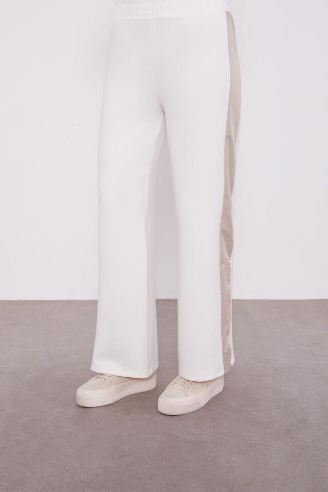 100527 TAKIM KOL UCU LASTİKLİ ÖNDEN FERMUARLI CEP DETAYLI BELİ BAĞLAMALI PANTOLONUN BELİ LASTİKLİ VE YAN DETAYLI TAKIM QKS