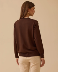 10002521710037 ÖNDEN DÜĞMELİ KOL UCU VE ETEK UCU LASTİKLİ MERSERİZE TRİKO HIRKA